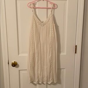 White dress. Warn once and in new condition.